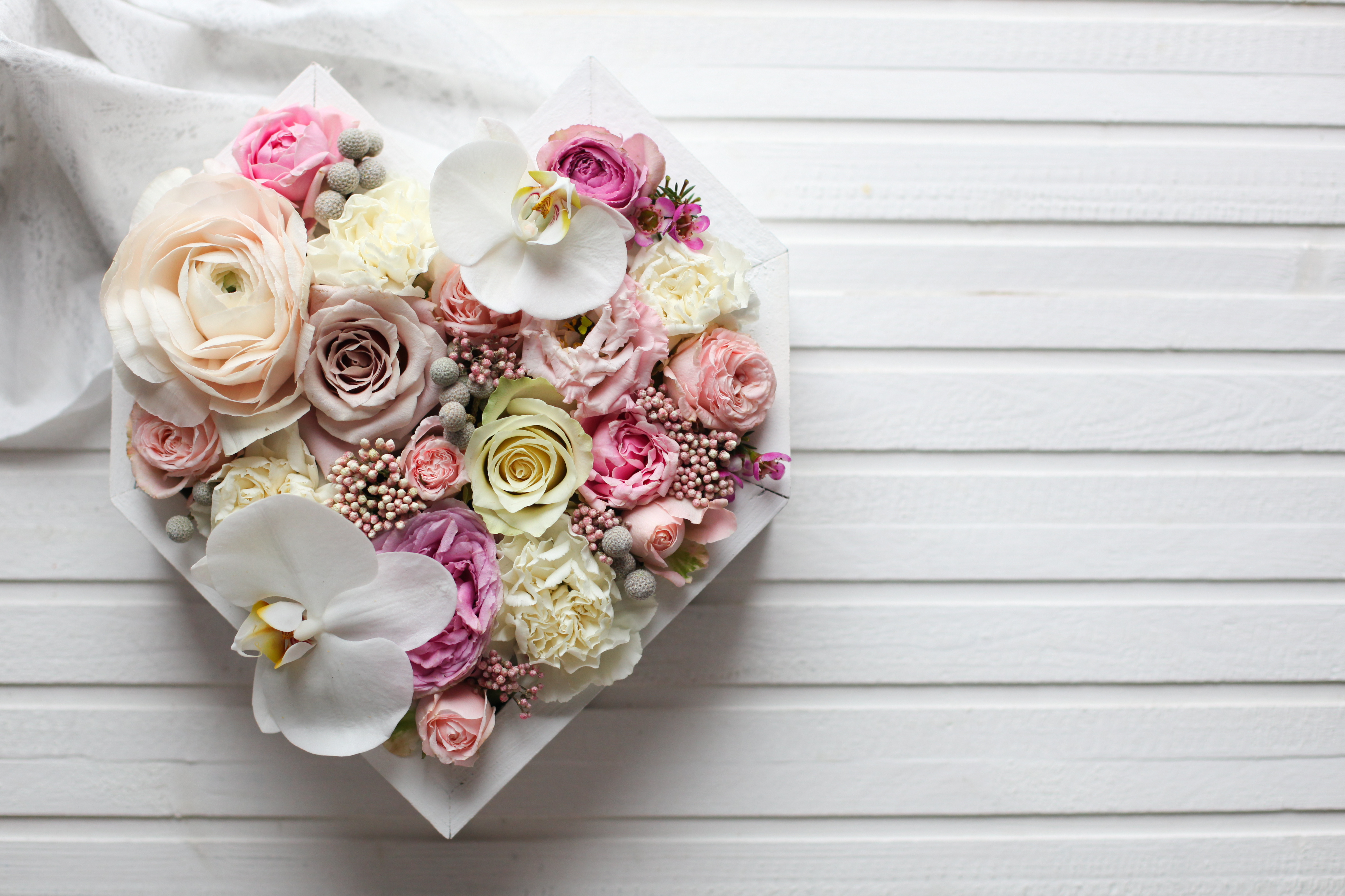 buket blomster, formet som et hjerte