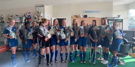 Fodboldhold med blomster