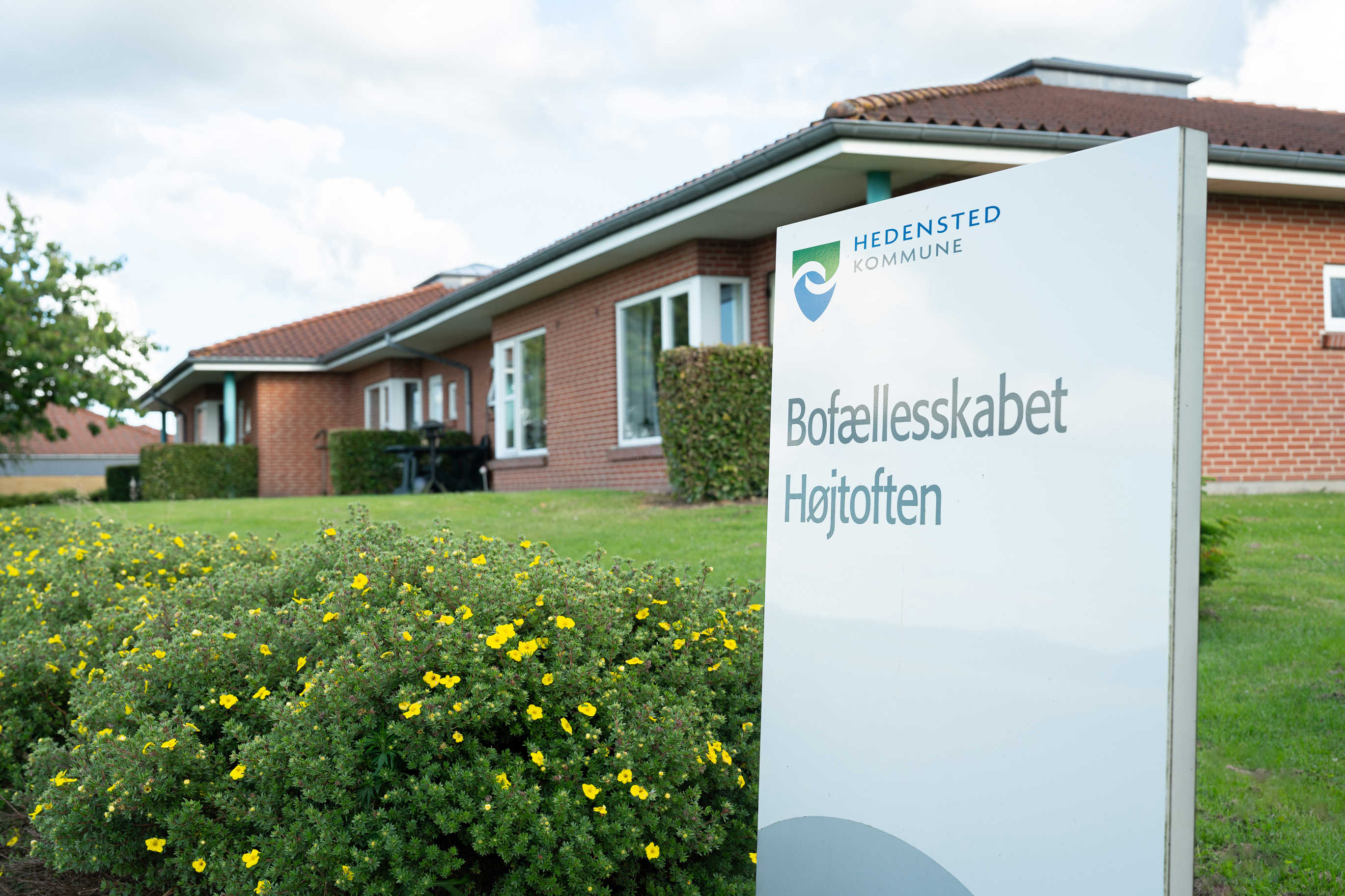 Indgangsskilt til Bofællesskabet Højtoften